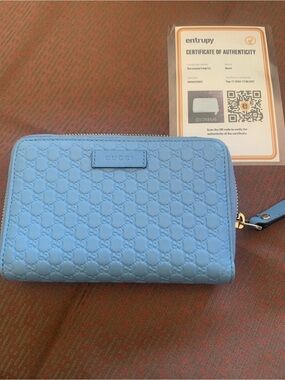 Entry blue embossed leather zip card holder